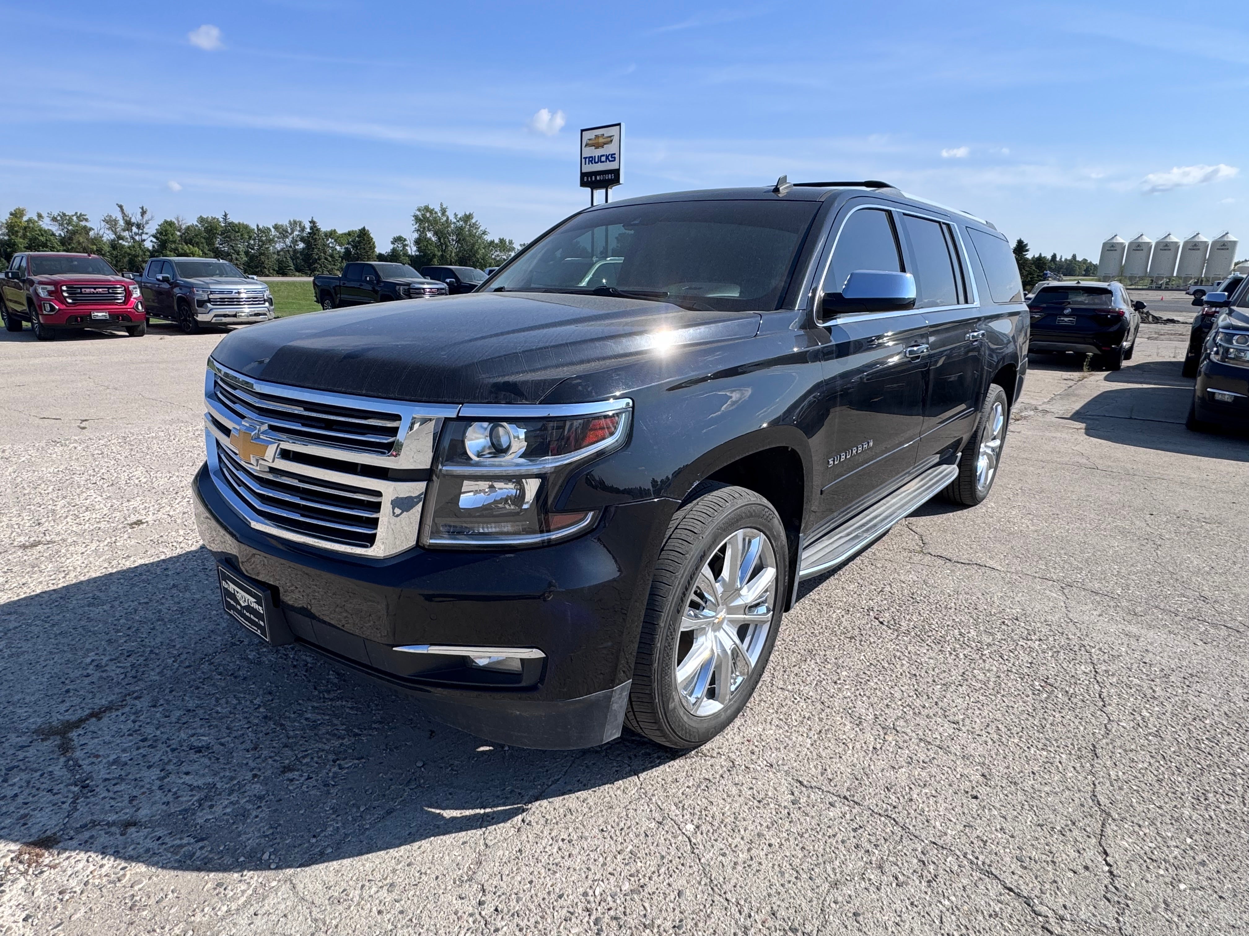 2015 Chevrolet Suburban LTZ in Black — front three-quarter view