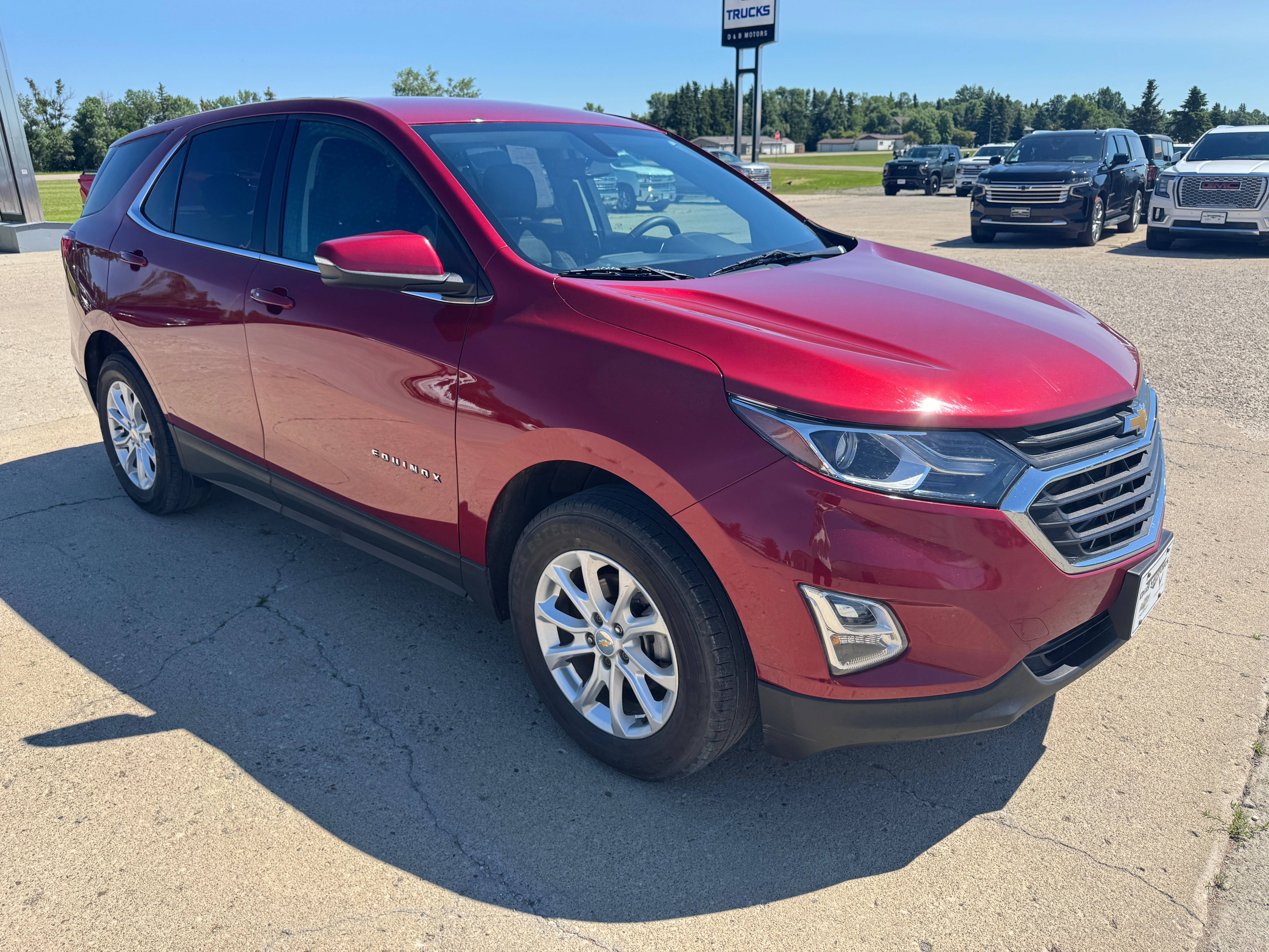 2018 Chevrolet Equinox LT in Cajun Red Tintcoat — front three-quarter view