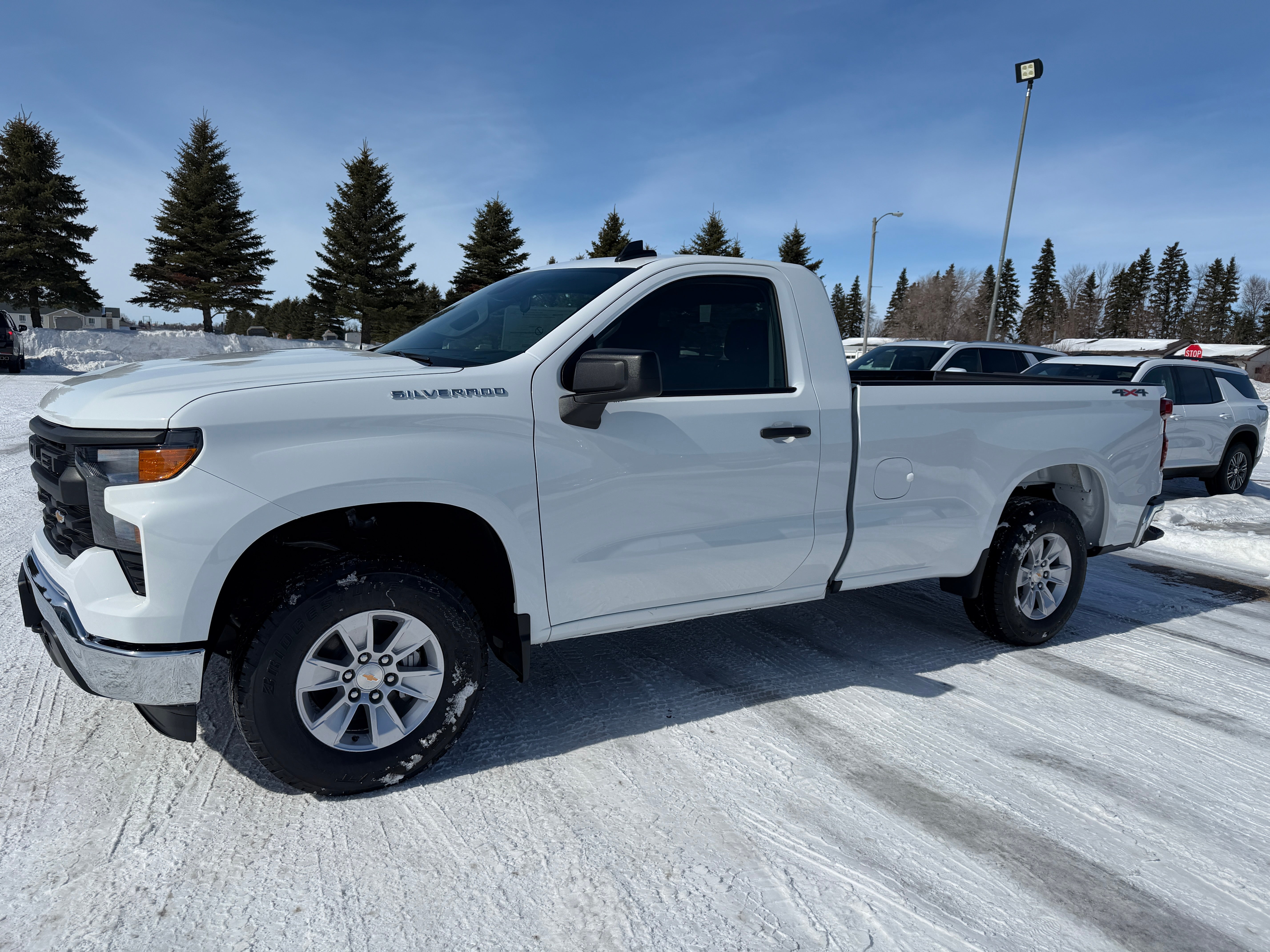 2026 Chevrolet Silverado 1500 WT in Summit White — front three-quarter view