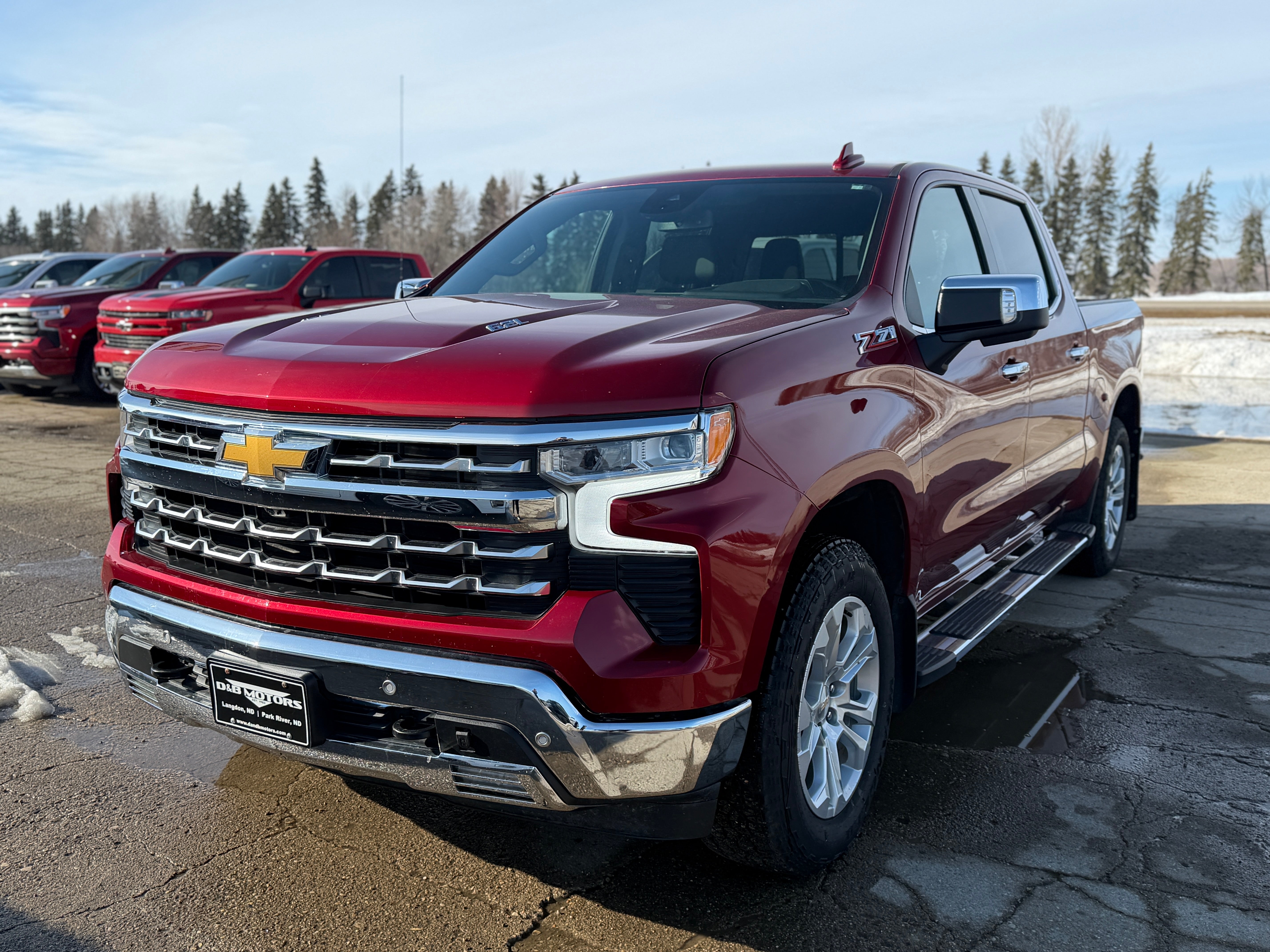 2022 Chevrolet Silverado 1500 LTZ in Cherry Red Tintcoat — front three-quarter view