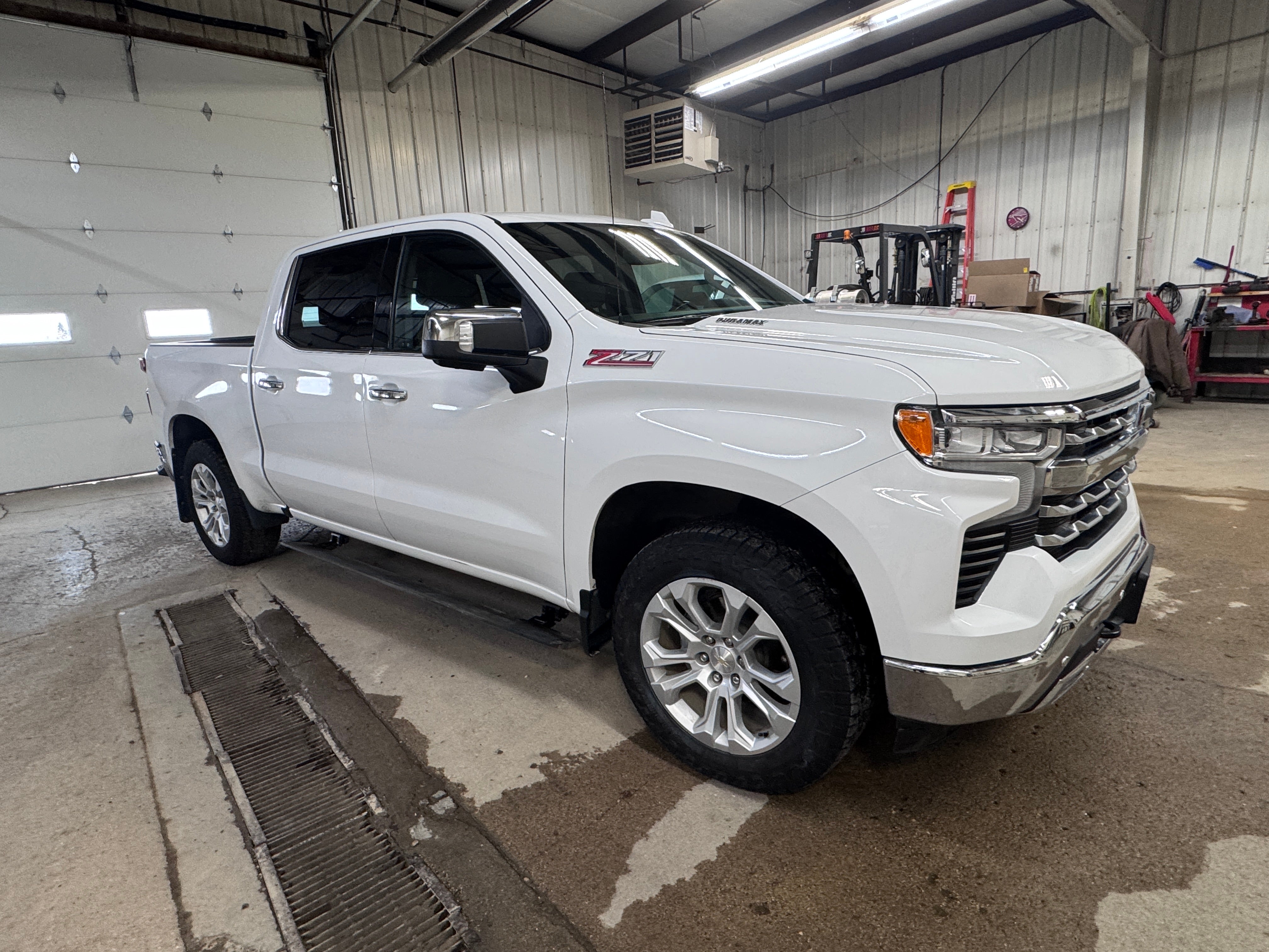 2022 Chevrolet Silverado 1500 LTZ in Summit White — front three-quarter view
