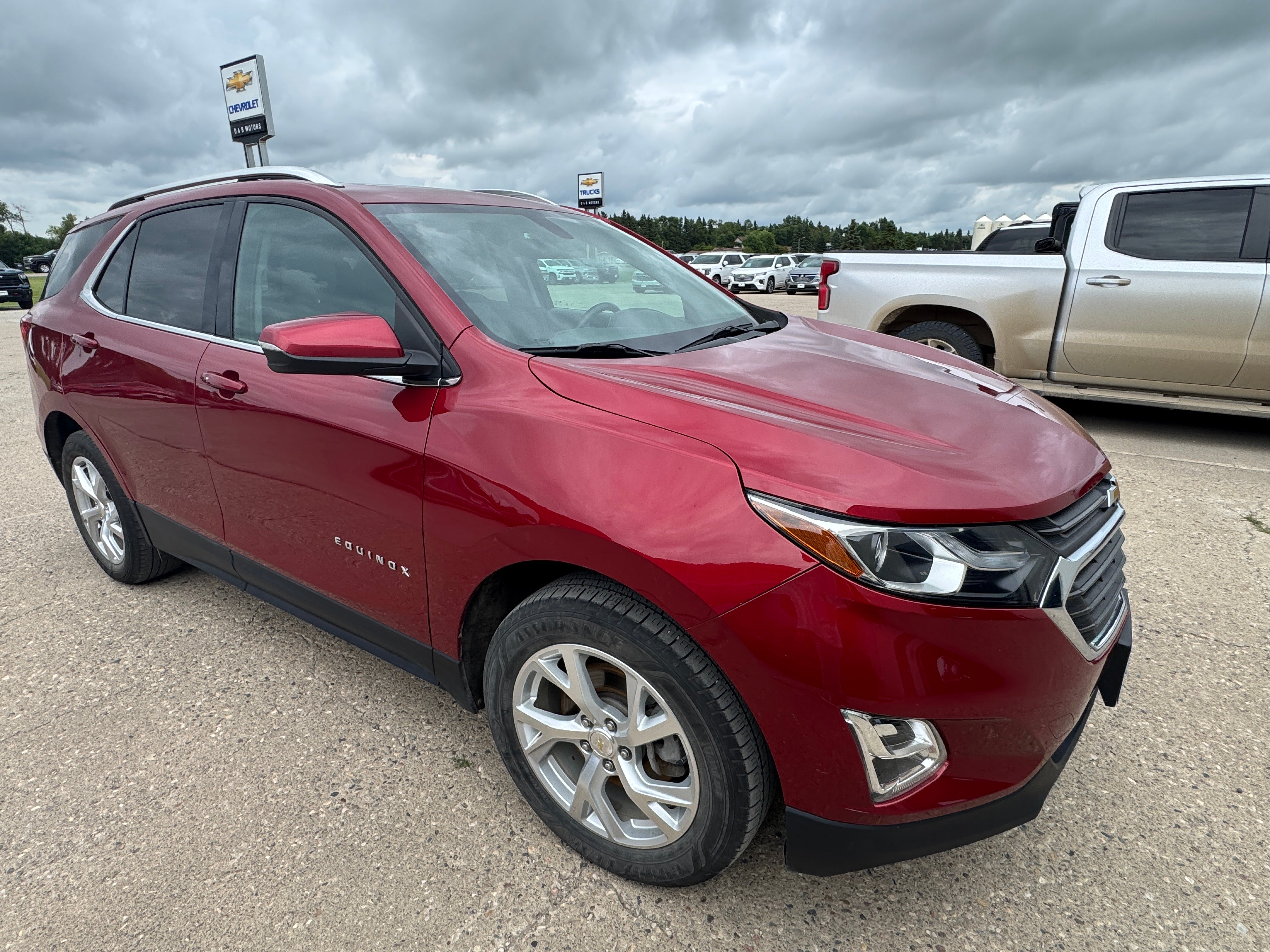 2018 Chevrolet Equinox LT in Cajun Red Tintcoat — front three-quarter view