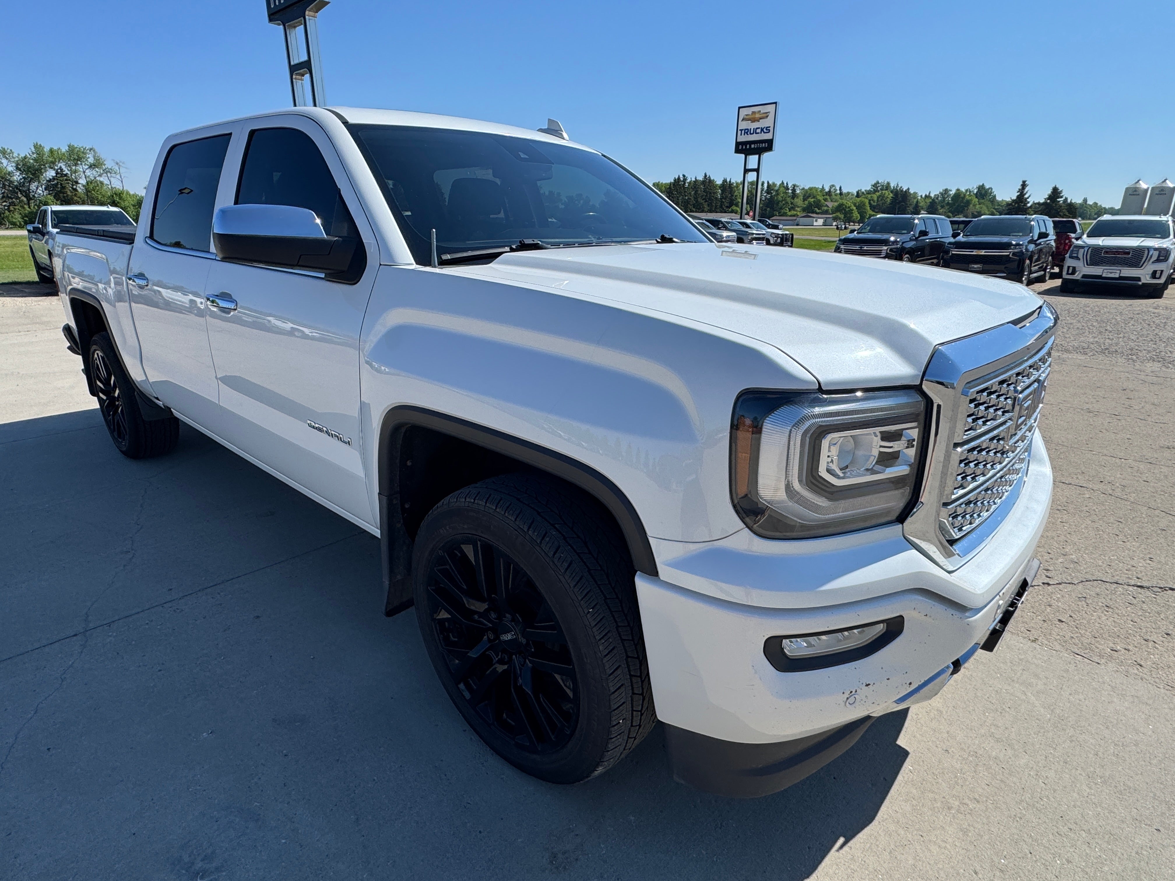 2017 GMC Sierra 1500 Denali in White Frost Tricoat — front three-quarter view